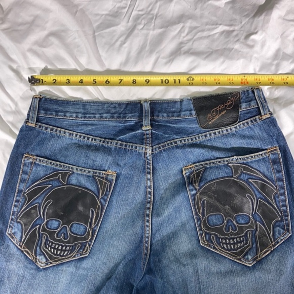 Vintage Ed Hardy Men’s Distressed Blue Jeans With Black Leather Skull on Pockets